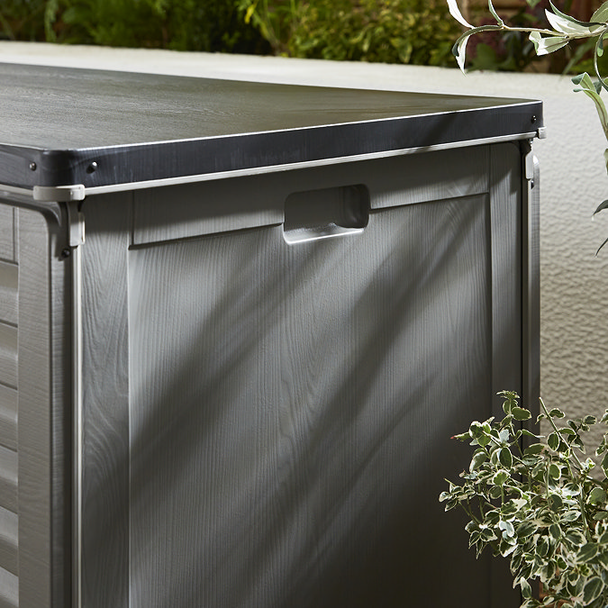 side on image close up on moulded handle of grey plastic storage box