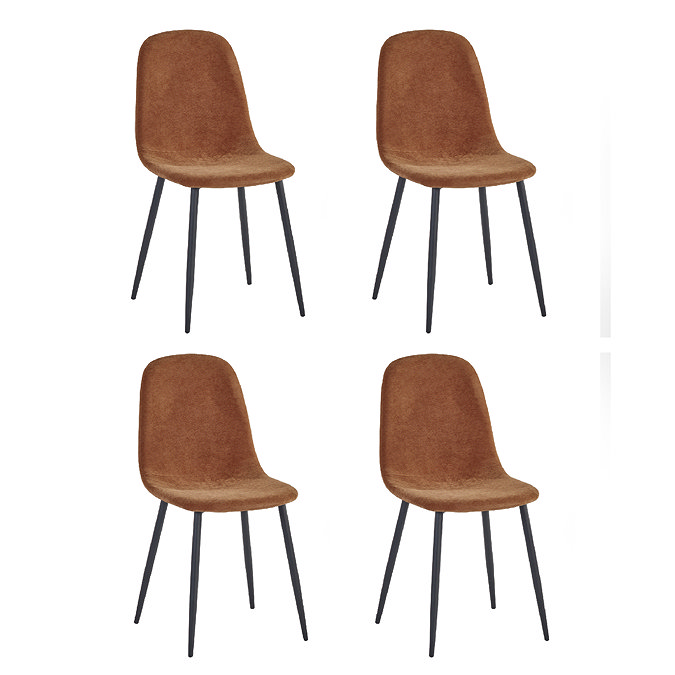 image cut out on white background of four orange chenille dining chairs