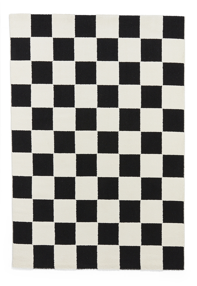 image cut out on white background of black and white checkered rug