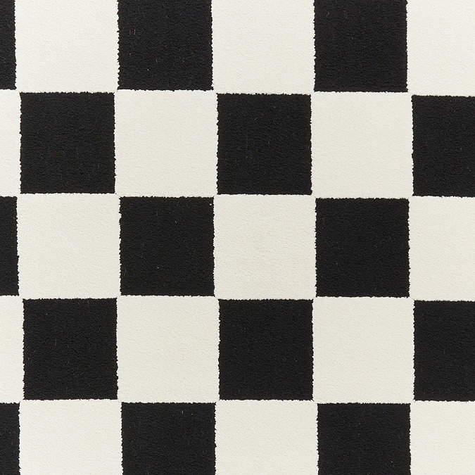 close up on black and white checkered pattern of rug