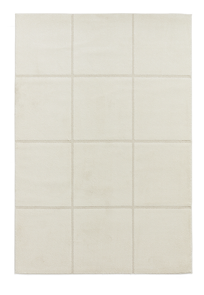 image cut out on white background of cream rug with lined detail