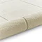 image of cream rug rolled up at the end