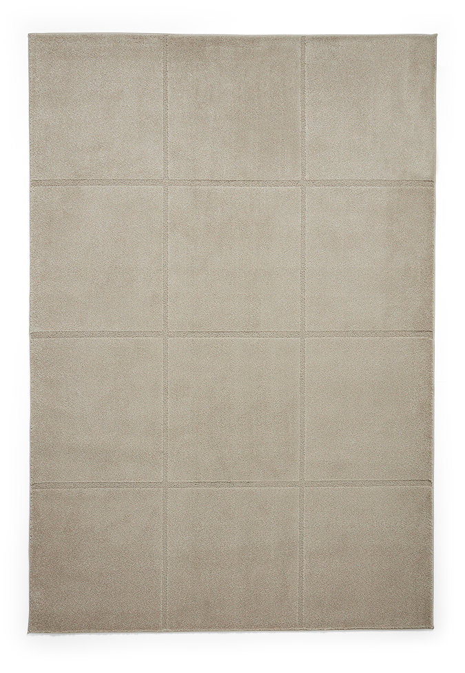 image cut out on white background of light brown rectangle rug
