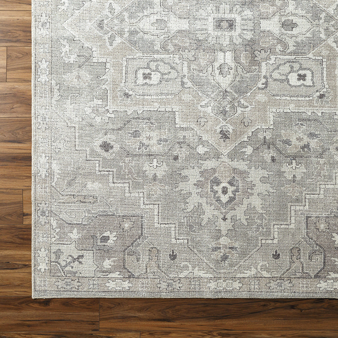 close up swatch image of dusty sage green vintage area rug, focus on colour and texture