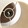 close up image from the top of lamp showing inside where bulb will sit