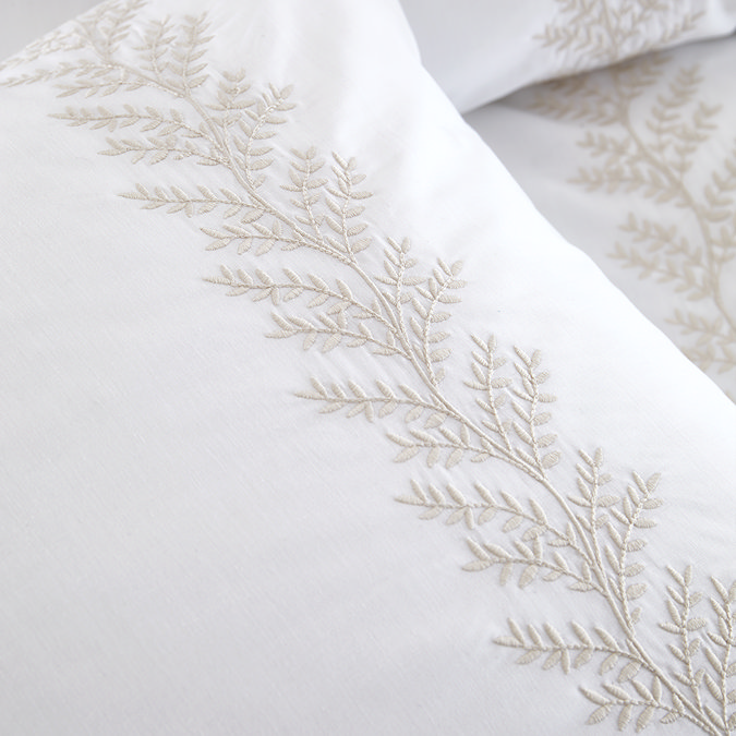 Embroidery Leaf duvet cover set close up on bed image 3