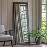 image of pewter grey freestanding mirror against wall