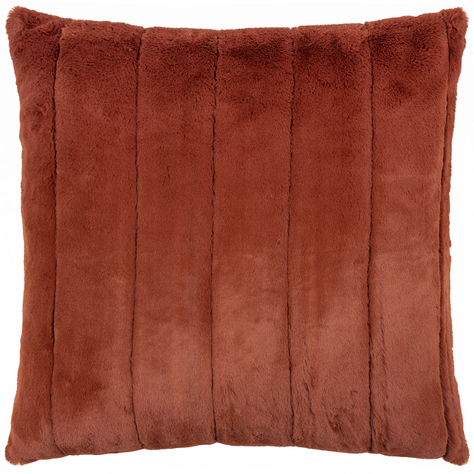 cut out of rust coloured faux fur cushion