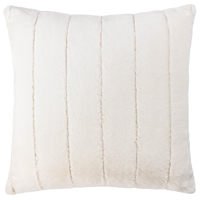 cream faux fur cushion cut out on white background