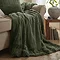 Empress pine throw draped over a sofa image 1
