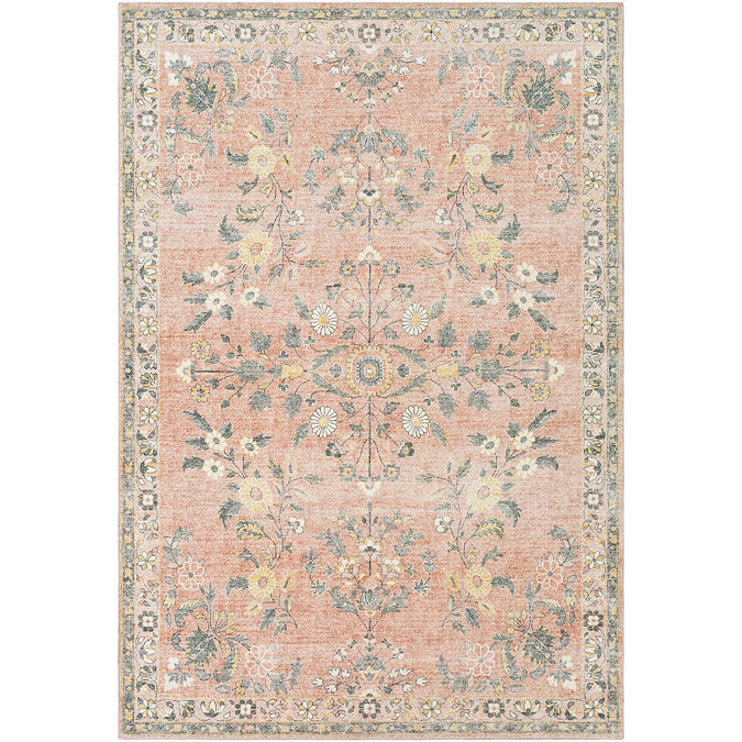 image cut out on white background of soft orange-pink rug with yellow and grey floral patterns