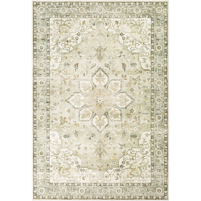 cut out on white background of sage and yellow floral vintage rug