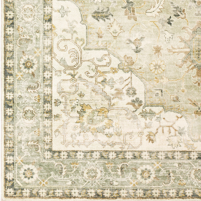 close up swatch image of sage and yellow rug with floral patterns