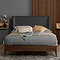 front on image of rectangular bed with walnut wood frame and grey boucle headboard