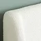 closer image of white boucle headboard, highlighting texture