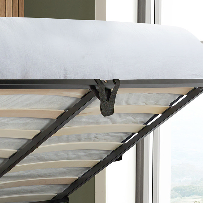 close up on raised mattress of ottoman bed