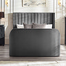 front on image of dark grey ottoman bed with rounded footboard and panelled headboard