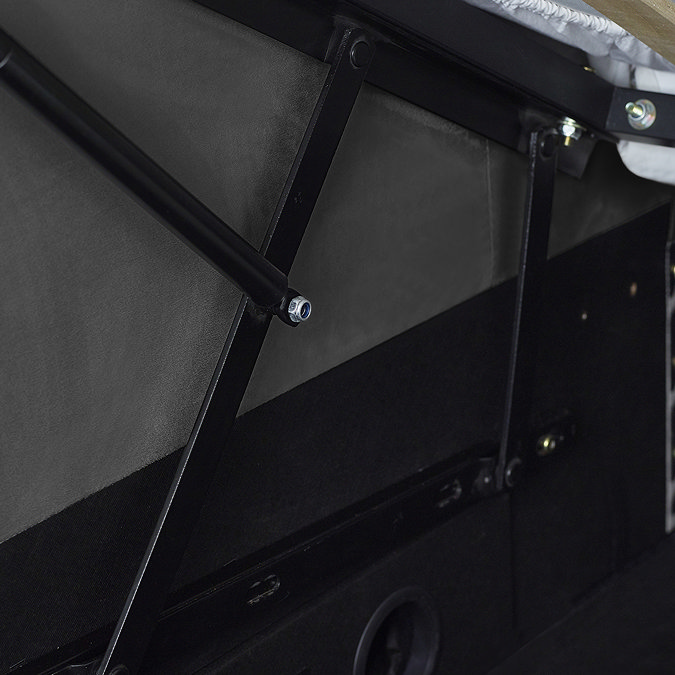 close up image of metal lifts of ottoman storage bed