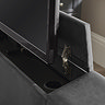 close up image of latch of tv compartment in dark grey ottoman bed