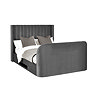 image cut out on white background of dark grey ottoman with rounded footboard