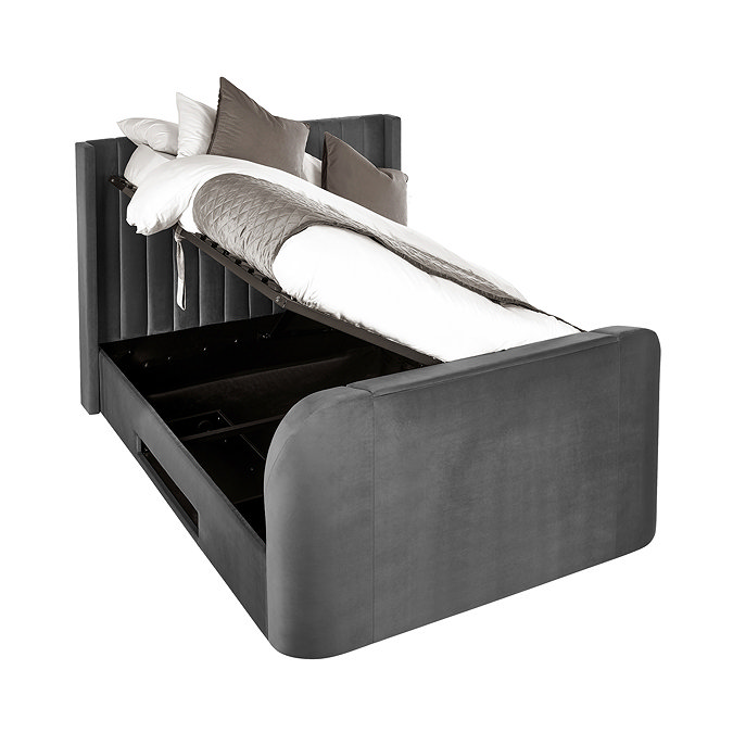 image cut out on white background of dark grey ottoman bed lifted up at the side to show storage space within