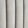 close up swatch image of light grey velvet fabric of ottoman bed