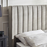 close up image of velvet light grey headboard of ottoman bed