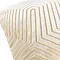 close up image of ivory velvet cushion with gold geometric detailing.