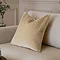 45x45cm ivory cushion with geometric detailing, sat in corner of cream sofa