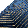 close up on pattern of navy blue velvet cushion with gold geometric detail