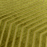 close up on pattern of olive green velvet cushion with geometric detailing