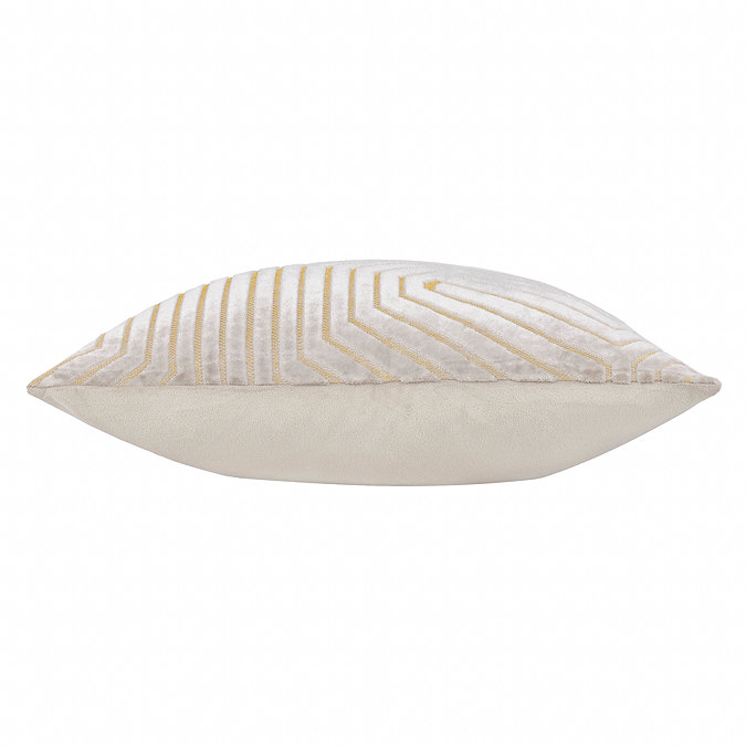 side on image of oyster coloured velvet cushion