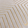 close up of pattern of oyster coloured velvet cushion with geometric cut detailing