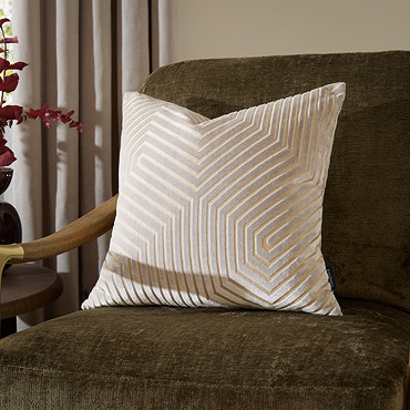 front image of oyster cream square cushion with geometric detailing, cut out on white background