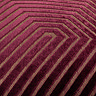 close up on pattern of burgundy red velvet cushion with gold geometric cut detail