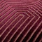 close up on pattern of burgundy red velvet cushion with gold geometric cut detail