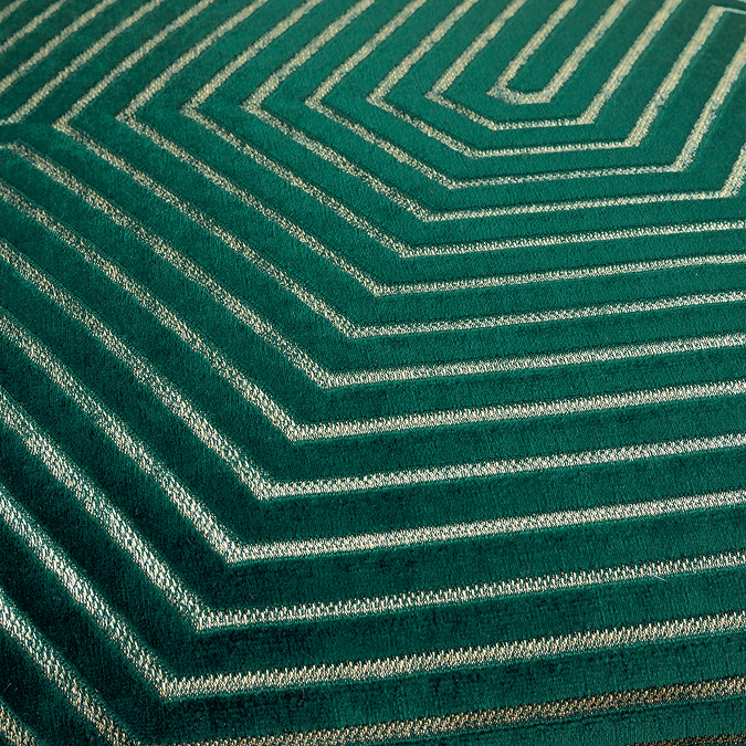 close up of pattern on emerald green cushion with cut velvet gold stitch detail