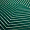 close up of pattern on emerald green cushion with cut velvet gold stitch detail