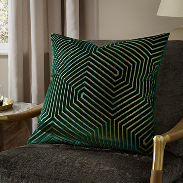 emerald green square cushion with geometric detailing, cut out on white background