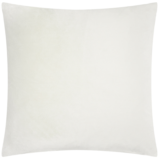 back image of cream cushion with plain velvet reverse