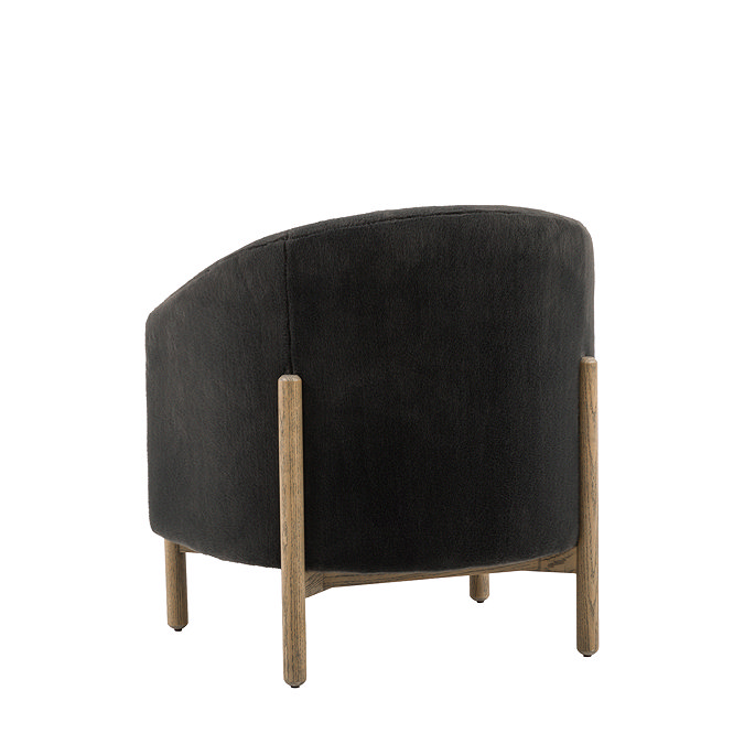 back facing cut out of graphite grey accent chair with ash wood legs