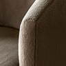close up image of soft khaki fabric of accent chair