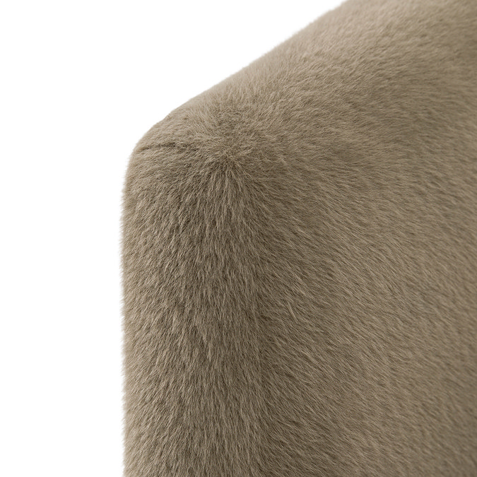 close up image of soft khaki accent chair