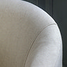 close up on natural fabric of accent chair