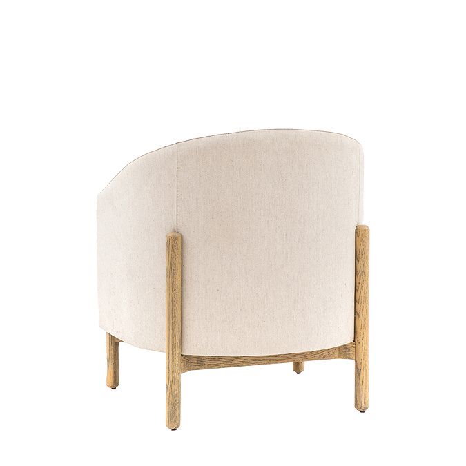 back image cut out of natural coloured accent chair with oak legs