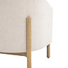 close up image of oak wood legs on natural coloured fabric accent chair