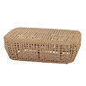 image cut out on white background of brown wicker base of garden footstool