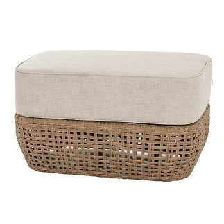 image cut out on white background of woven brown garden footstool with plush cream cushioned top