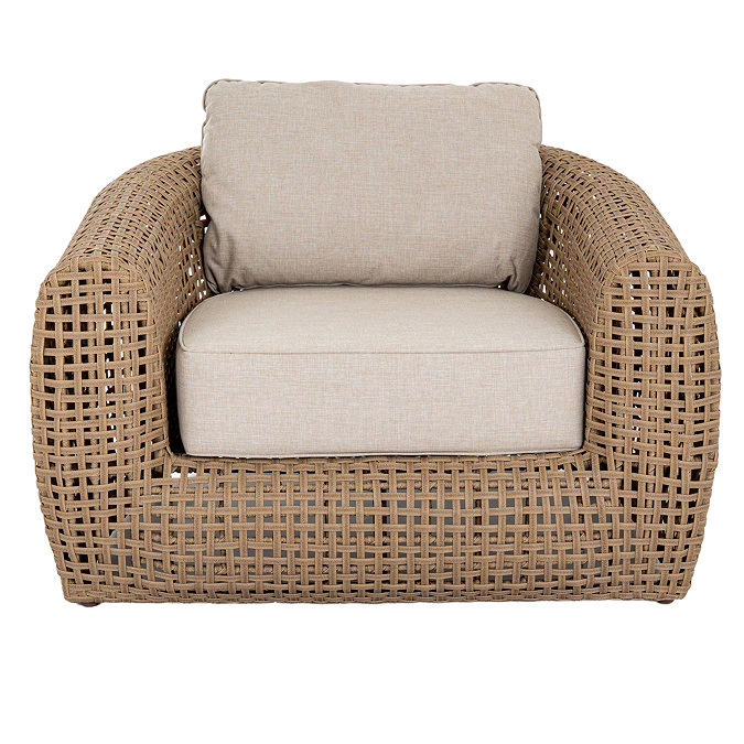 front on image cut out on white background of brown weave armchair with large plush cushions