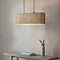 image of natural woven seagrass double pendant light against dining room wall